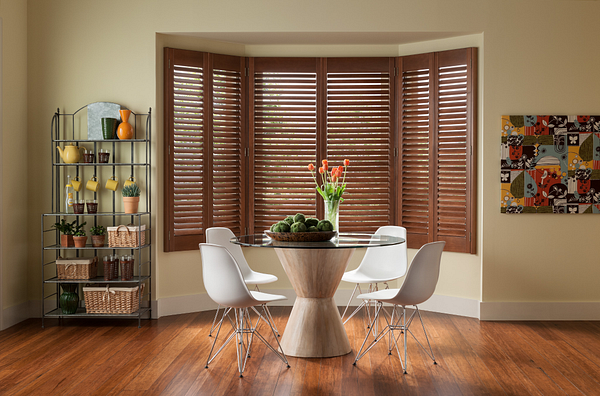Dark wood shutters against neutral colors